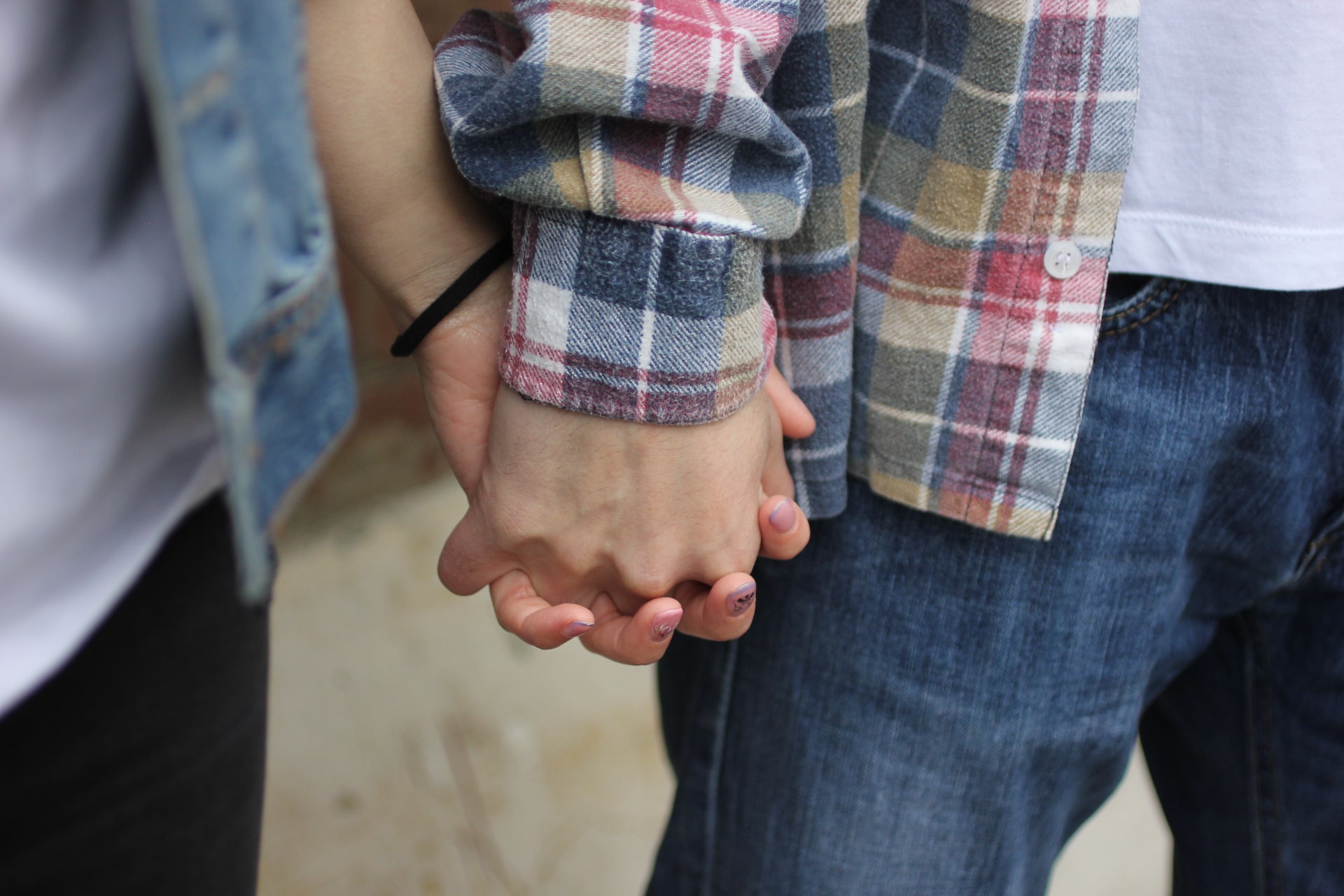 couple holding hands