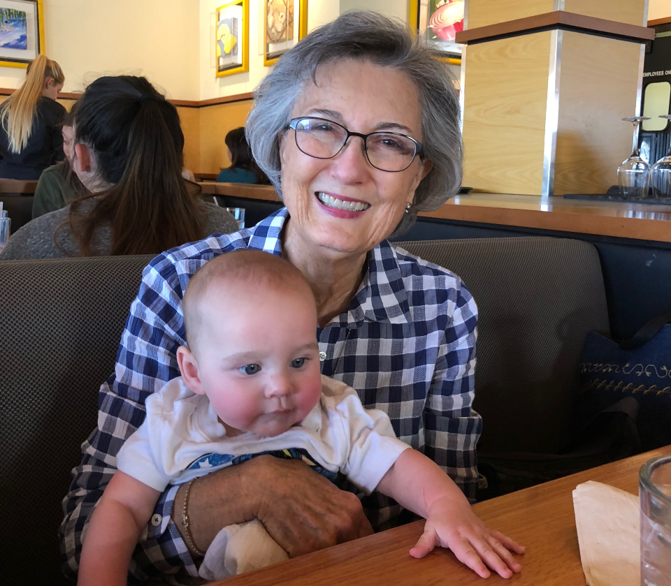 Cynthia Heald holding baby