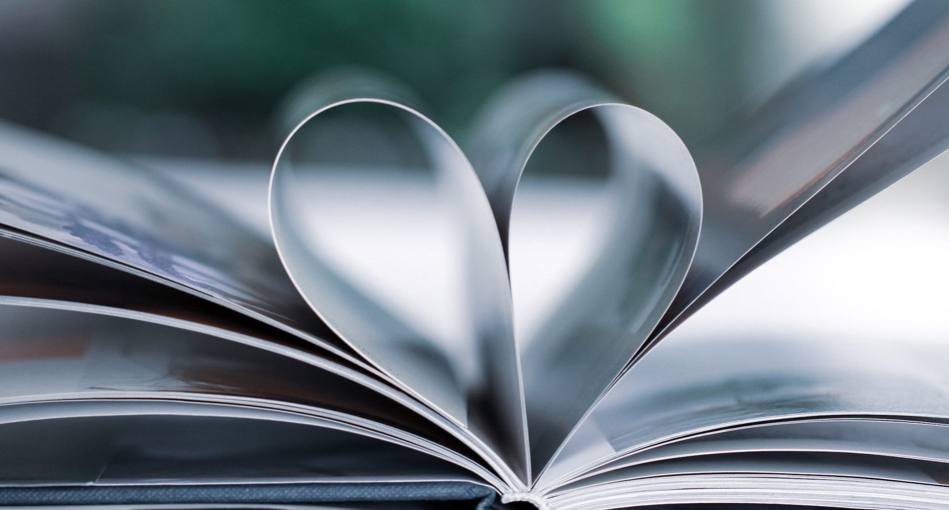 A book with pages folded into the shape of a heart
