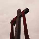 Cross against a cloudy sky