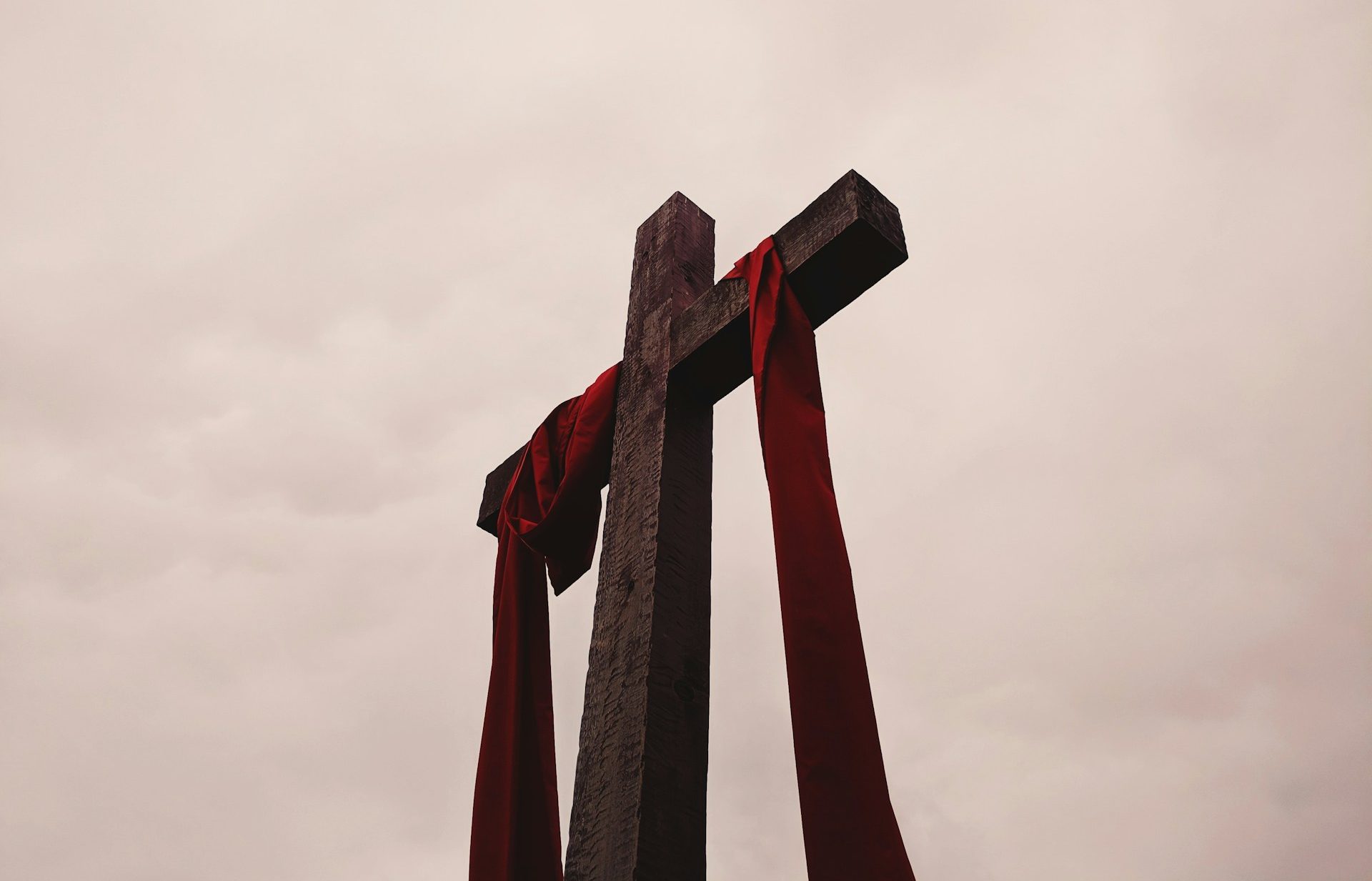 Cross against a cloudy sky