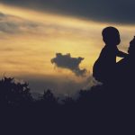 Mother holding child